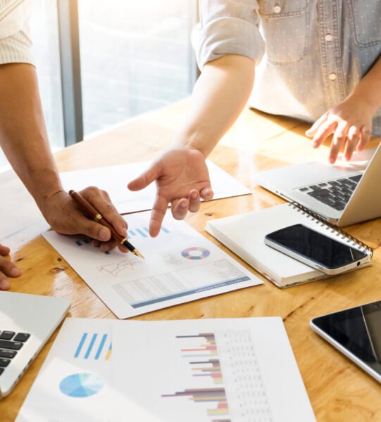 Business people meeting to discuss the situation on the market.